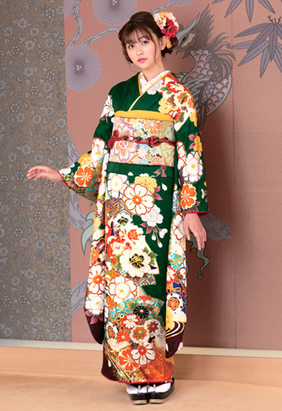 シックな地色に咲く花々が華やか。